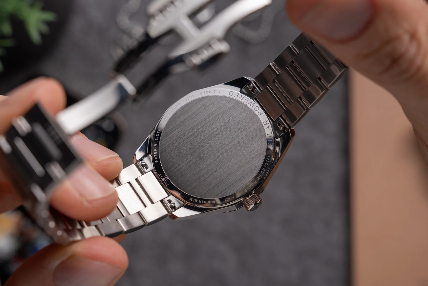 tissot-prc-100-solar-39mm-silver-caseback.jpg